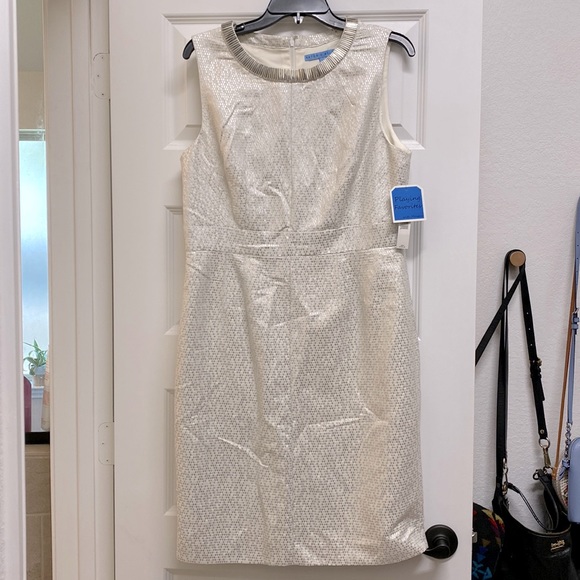 ANTONIO MELANI Dresses & Skirts - NWT. White and silver Antonio Melani dress. Size 12.